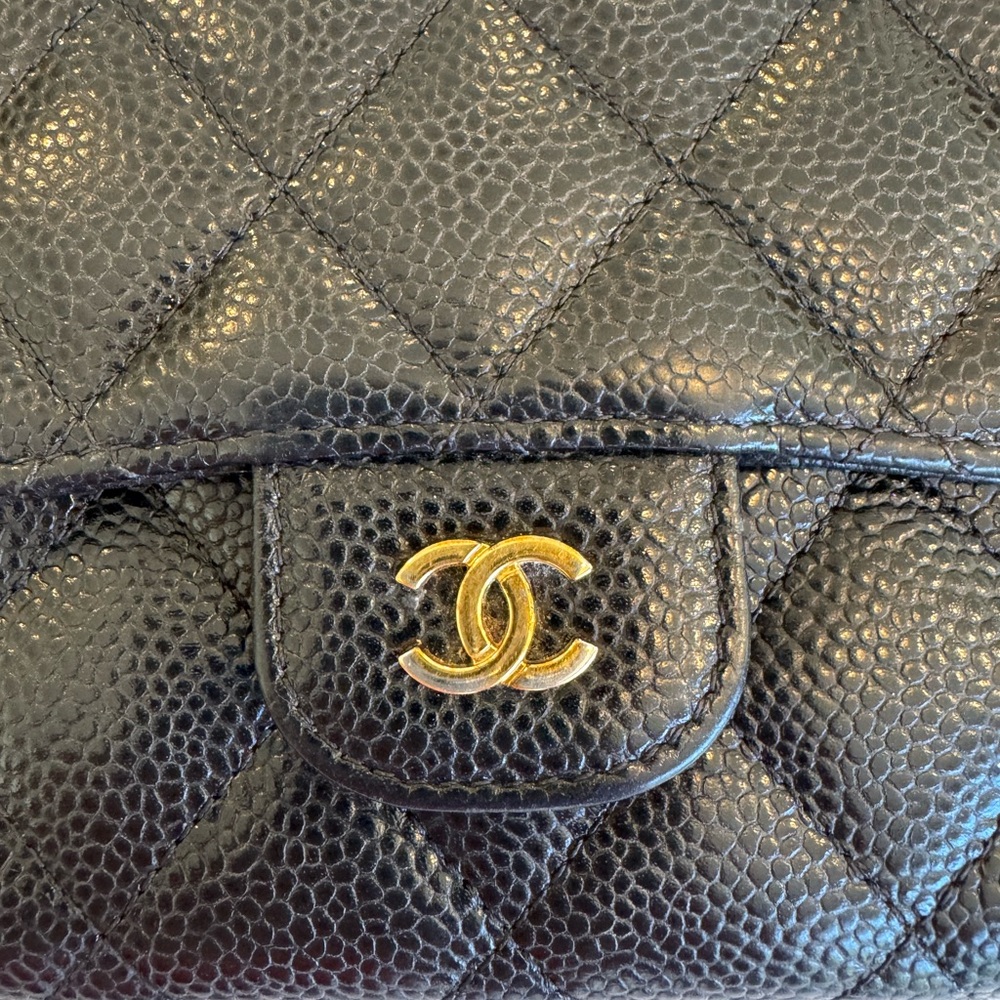 CHANEL Black Quilted Leather Clutch with Gold Logo - Picture 15 of 16